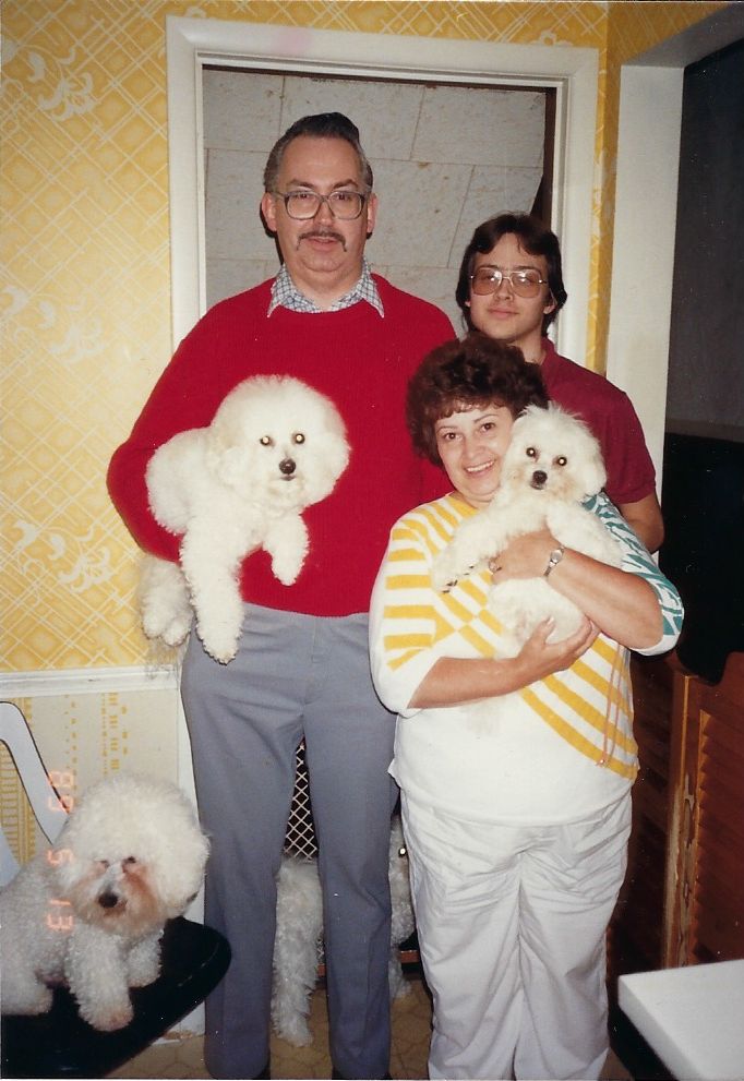 Richard, Christopher, and Janet Johnson with dogs